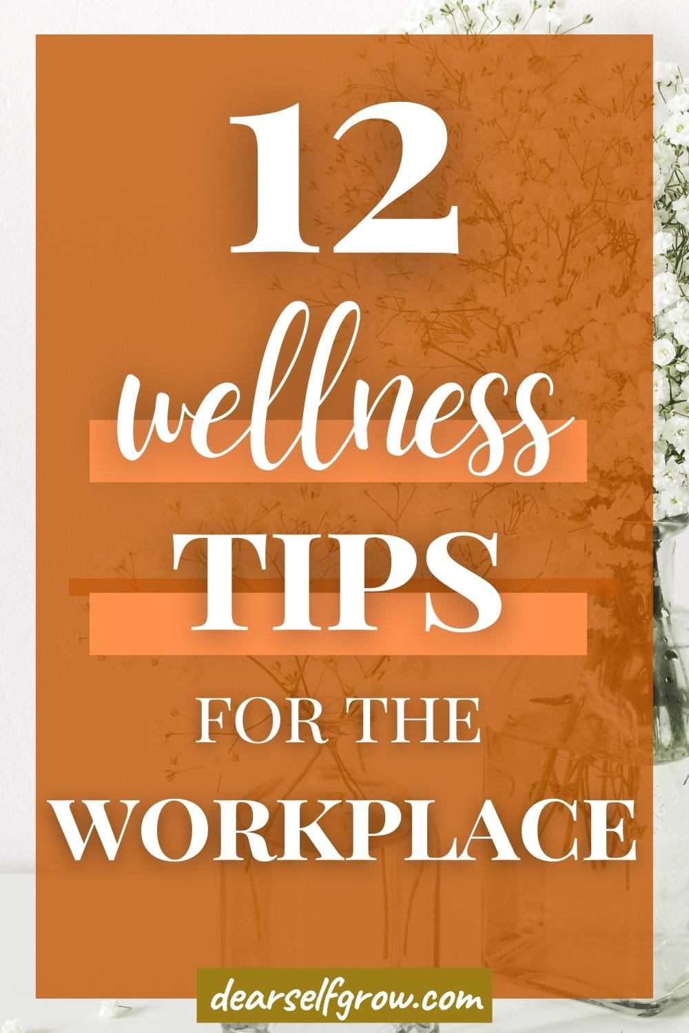 A flower in a vase with text overlay 12 wellness tips for the workplace. This image is pinnable.
